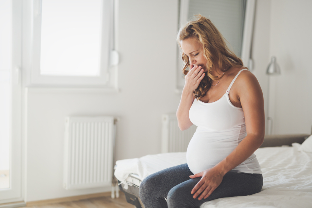 Как да се справите с киселините през бременността