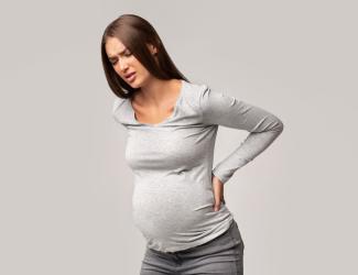 Болки в гърба през бременността 